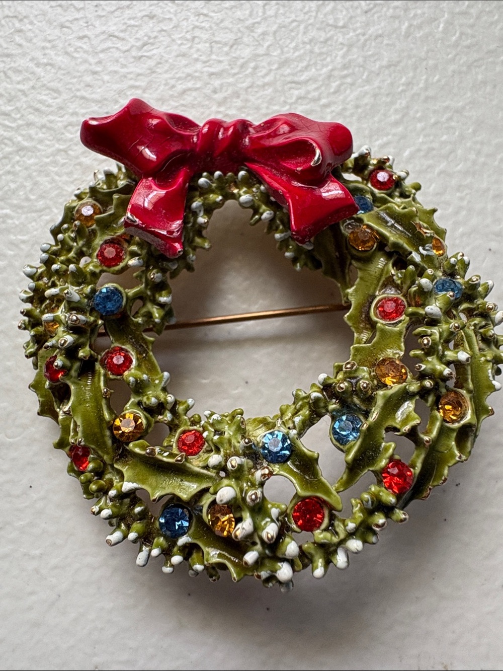 1960 Green Enamel Wreath Brooch with Red Bow and Multi-Color Rhinestones